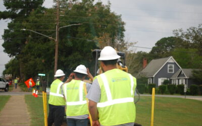 Southern Pipeline employees working with safety hard hat and vests on