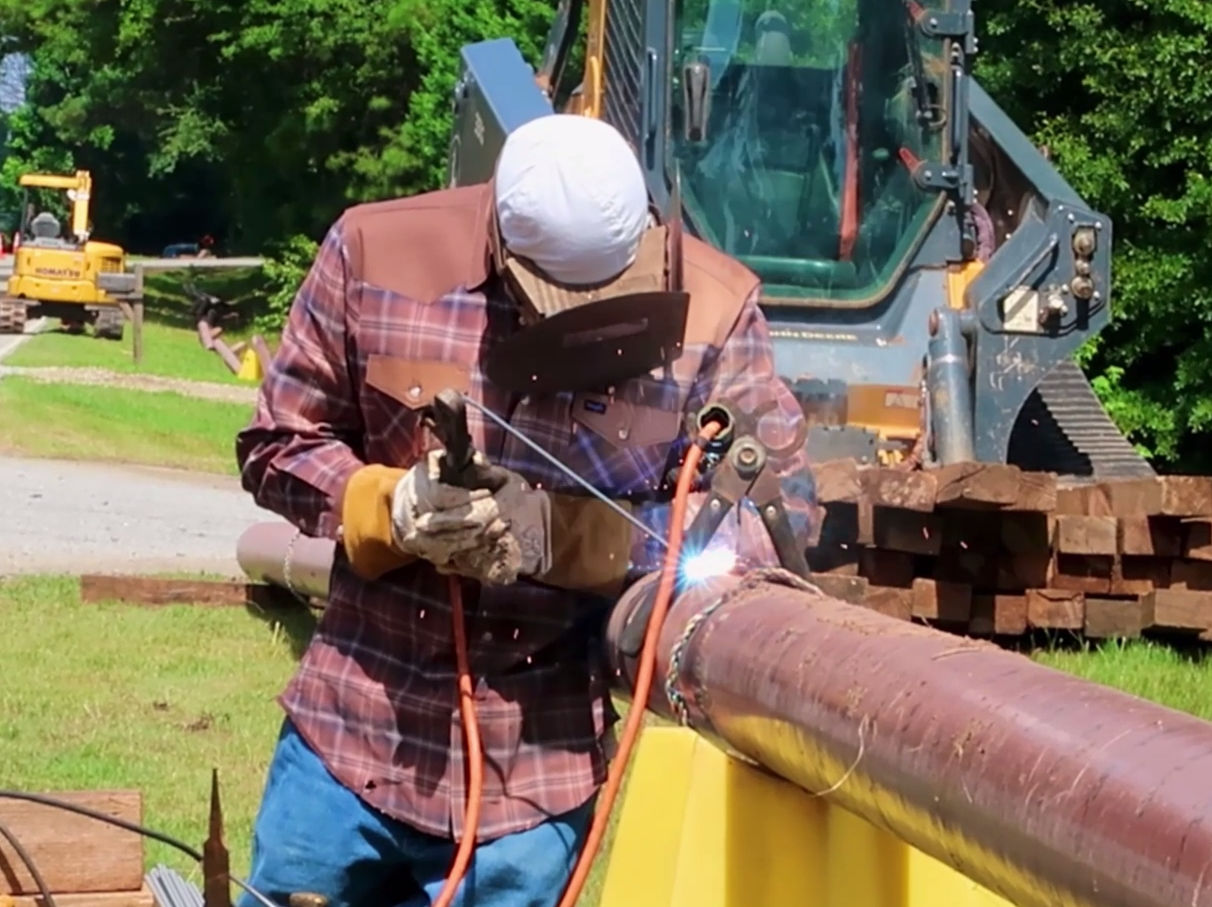 Southern Pipeline employee welding pipe